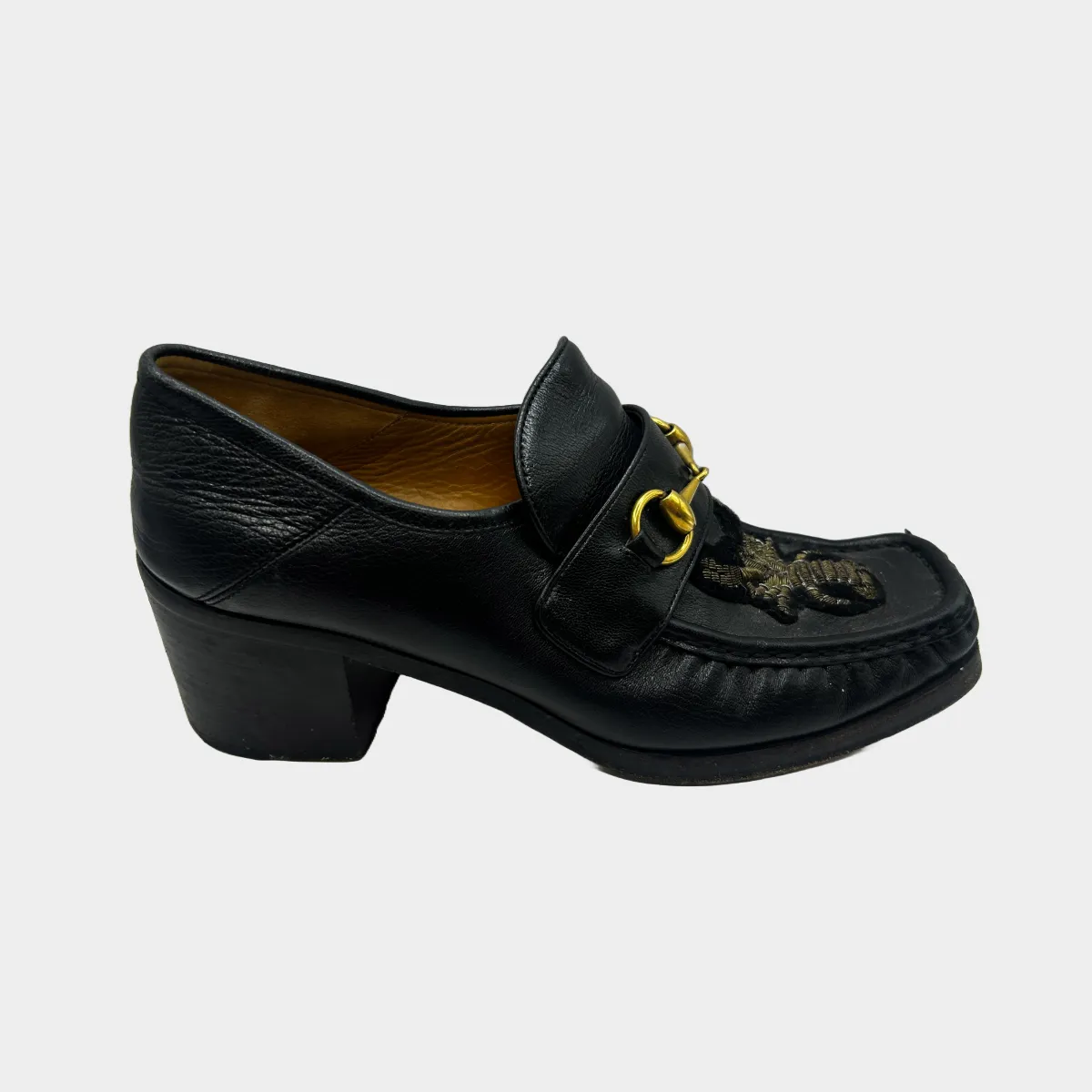 Gucci women's black leather heeled loafers with Disney motif